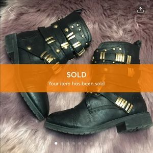 Black gold combat boots used